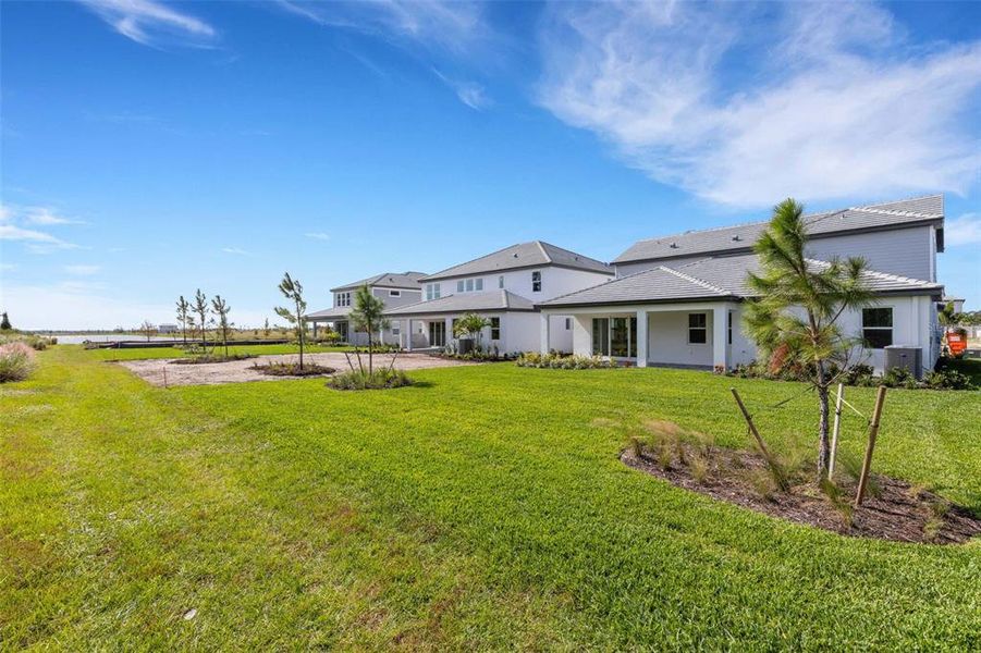 Exterior details and patio area of a home in Hawkstone, Sarasota (Image 28).