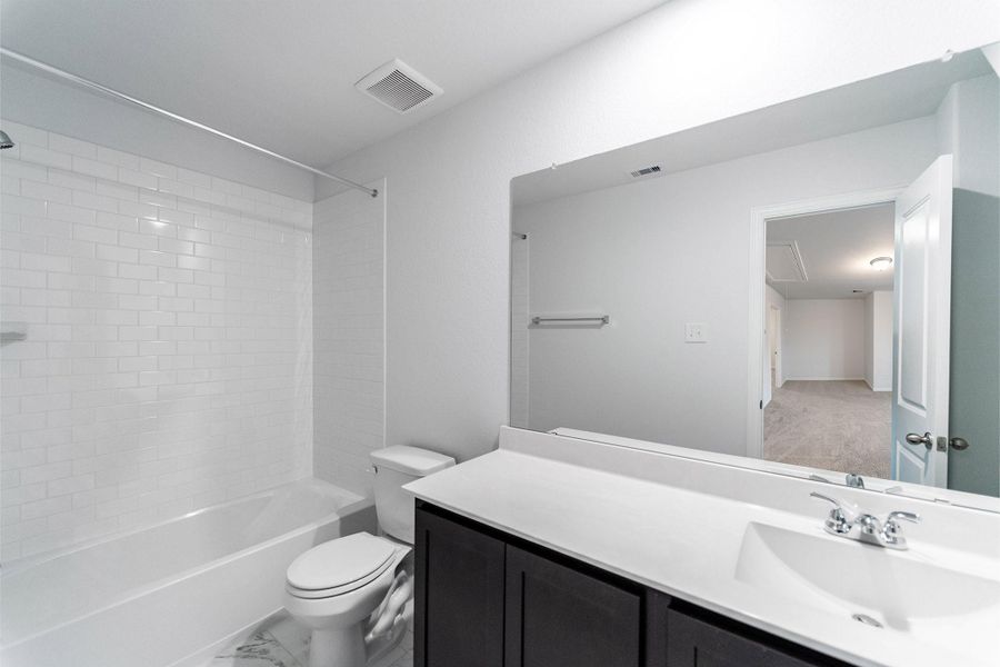 Furnished interior view inside a new home in Pecan Estates, Crosby (Image 7).