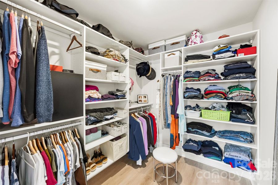 Upper level-Primary suite walk in closet. Upper level-Primary suite walk in closet.