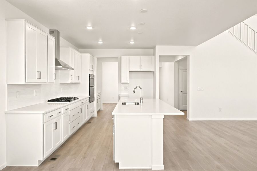 Furnished interior view inside a new home in Cordovan, Firestone (Image 6).