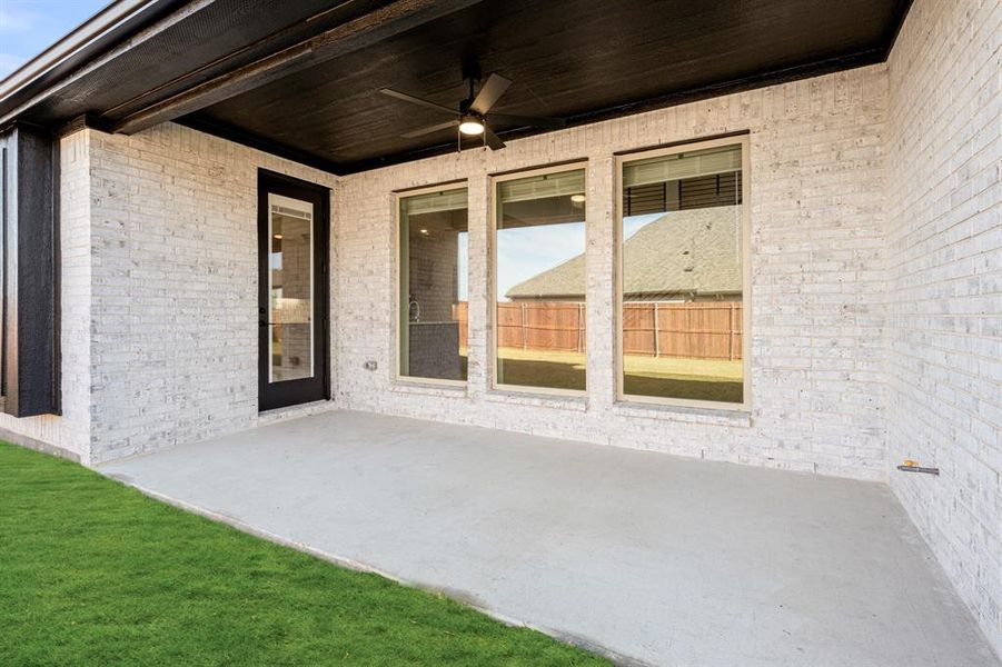 Exterior details and patio area of a home in Devonshire Classic 60-65, Forney (Image 23). Exterior details and patio area of a home in Devonshire Classic 60-65, Forney (Image 23).