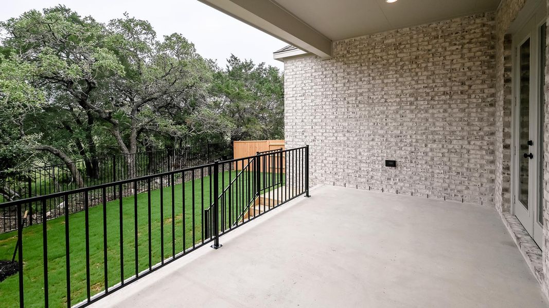 Exterior details and patio area of a home in 6 Creeks, Kyle (Image 3).