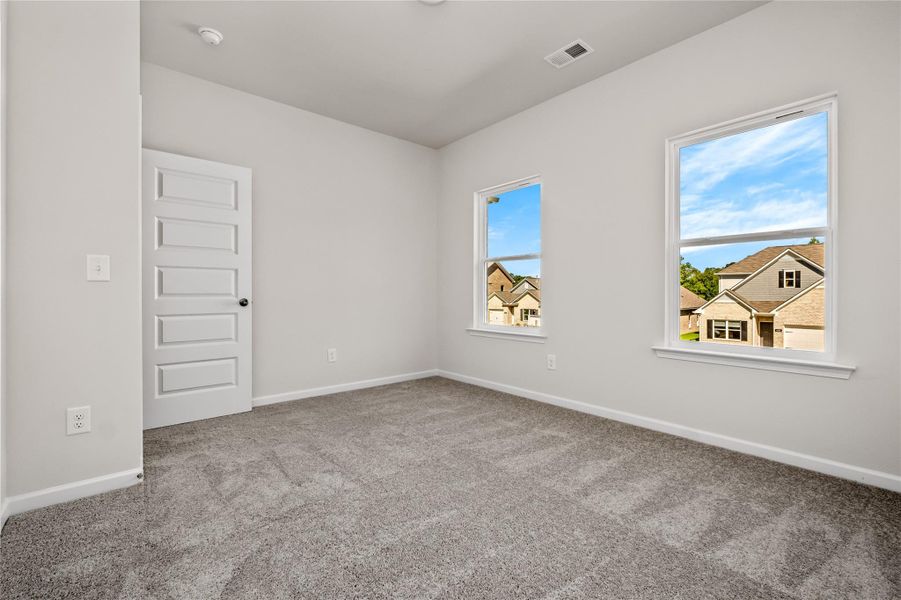 The Coleman- Secondary Bedroom. Home under construction, photo used for illustrative purposes only, colors and options will vary. The Coleman- Secondary Bedroom. Home under construction, photo used for illustrative purposes only, colors and options will vary.