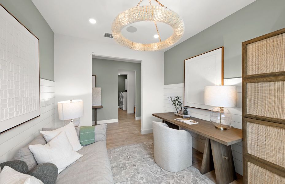 Representative furnished interior of a home built from the Palmary by DiVosta in BeachWalk by Manasota Key, Englewood (Image 25).