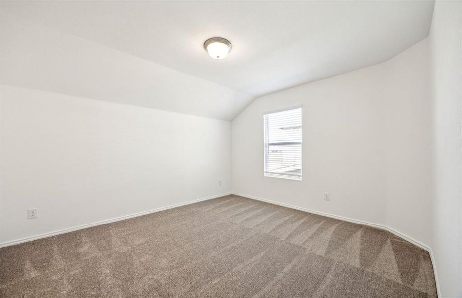 Comfortable bedroom with a bright window view