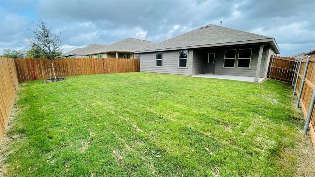 Yard and Patio - All Home and community information, including pricing, included features, terms, availability and amenities, are subject to change at any time without notice or obligation. All Drawings, pictures, photographs, video, square footages, floor plans, elevations, features, colors and sizes are approximate for illustration purposes only and will vary from the homes as built.