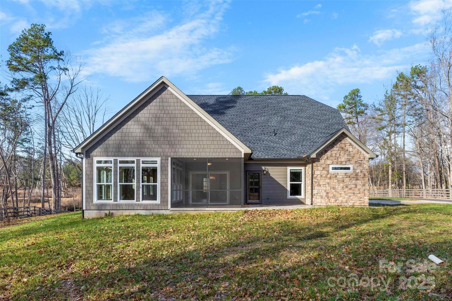 Exterior details and patio area of a home in , Belmont (Image 4).