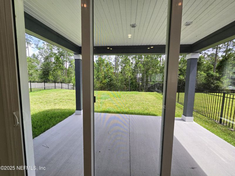 Exterior details and patio area of a home in Hyland Trail, Middleburg (Image 4).