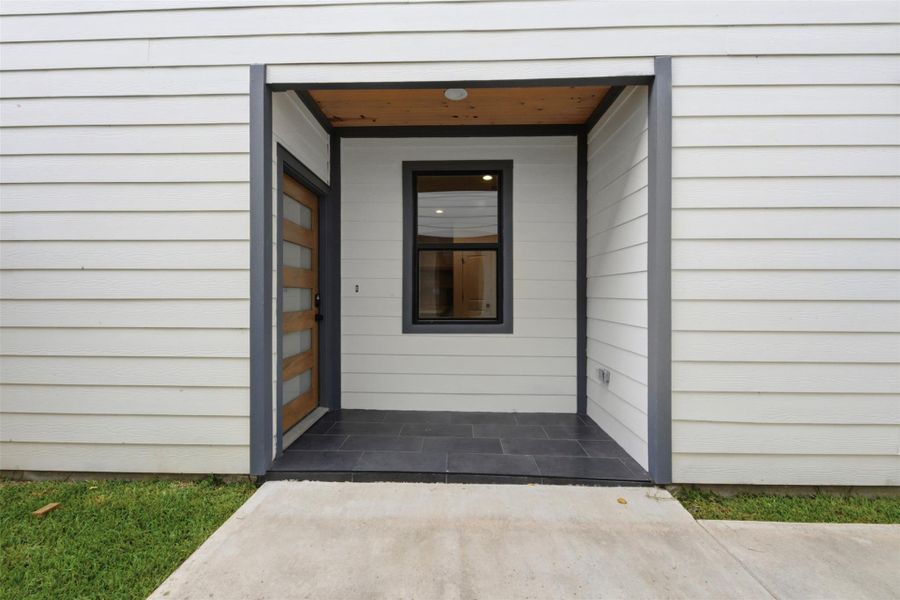Exterior details and patio area of a home in , Houston (Image 3).