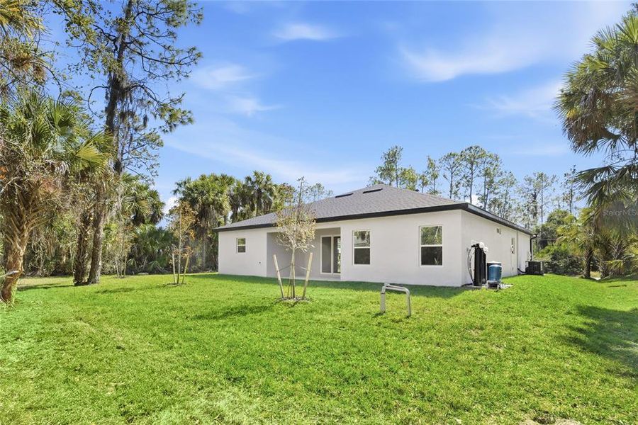 Exterior details and patio area of a home in , North Port (Image 20).
