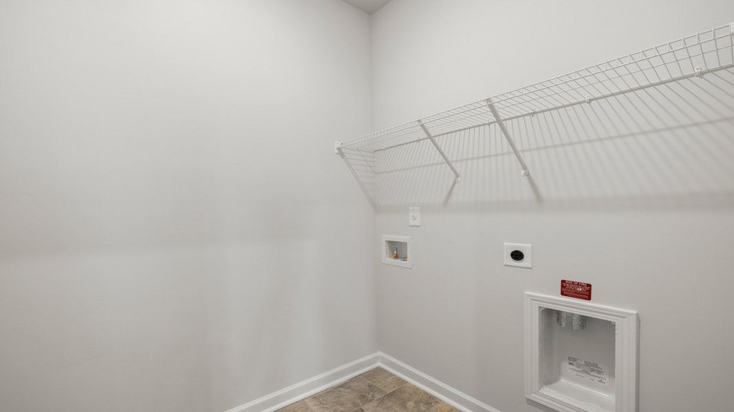 Representative unfurnished interior of a home built from the Cali by D.R. Horton in The Abbey at Trolley Run Station, Aiken (Image 24).