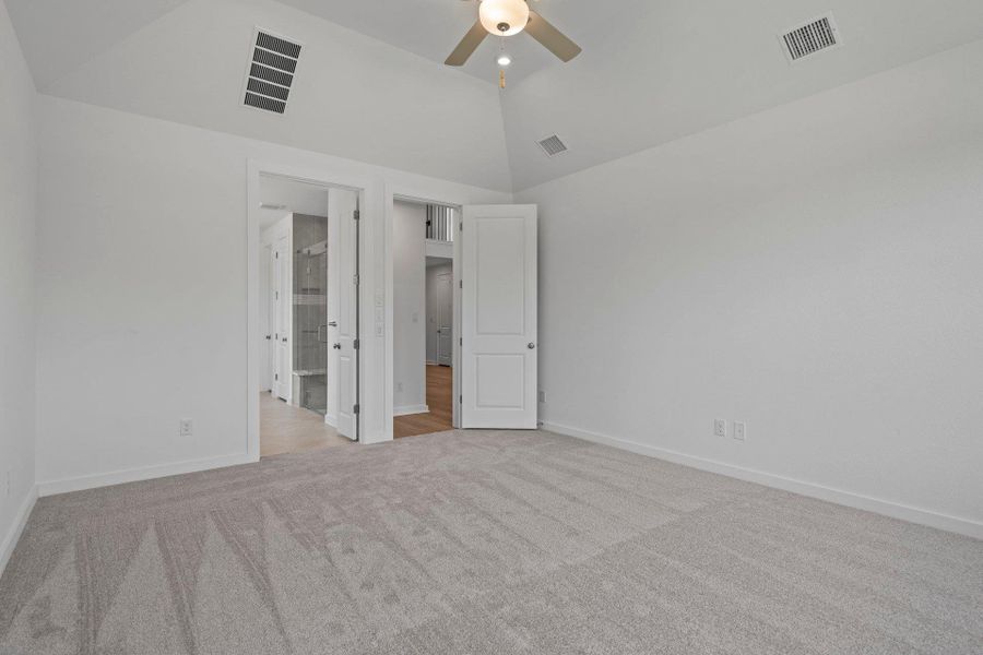 Primary Bedroom with elevated ceiling