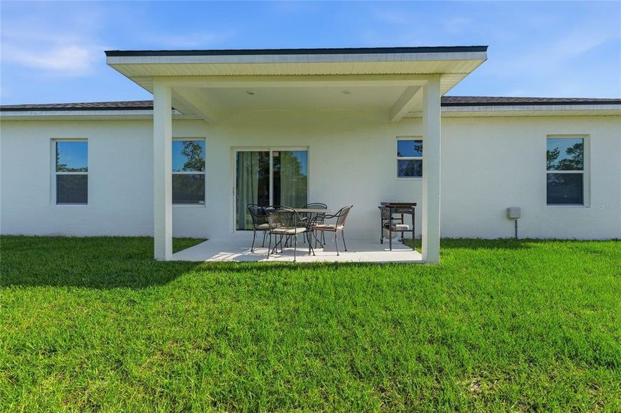 Exterior details and patio area of a home in , Ocklawaha (Image 25).