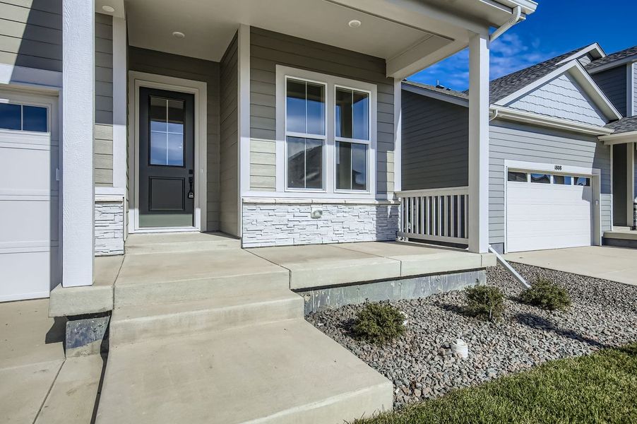 Exterior details and patio area of a home in Country Club Reserve – Fort Collins, Fort Collins (Image 4).