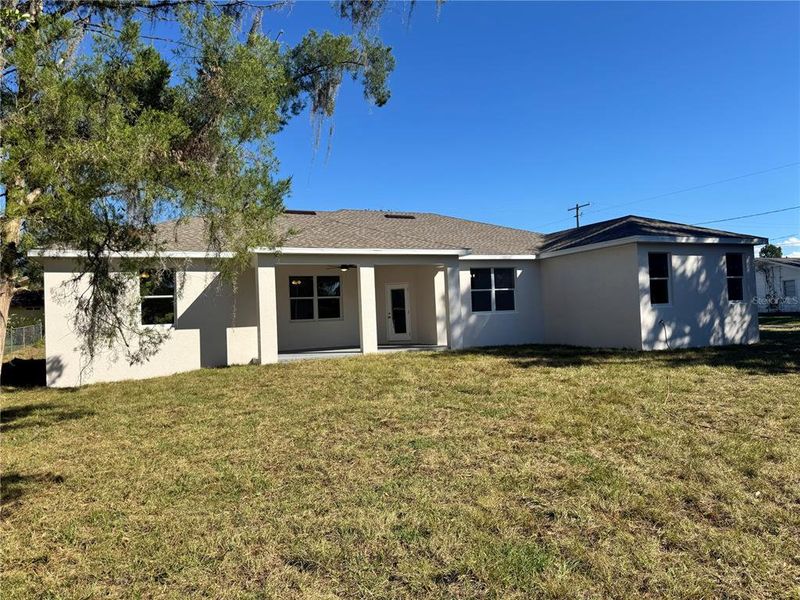 Exterior details and patio area of a home in , Dade City (Image 38).
