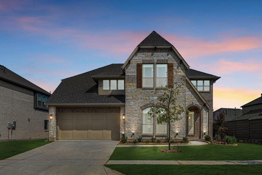 Front exterior of a new home in Union Park Classic 55, Little Elm, TX, highlighting curb appeal (Image 22). Front exterior of a new home in Union Park Classic 55, Little Elm, TX, highlighting curb appeal (Image 22).