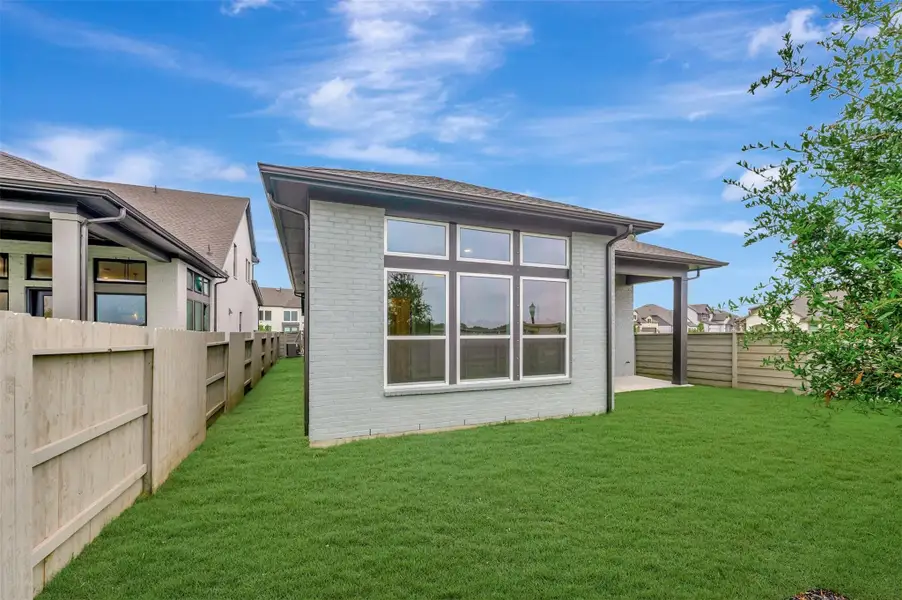 Exterior details and patio area of a home in Pomona - Reserve Collection, Manvel (Image 27).