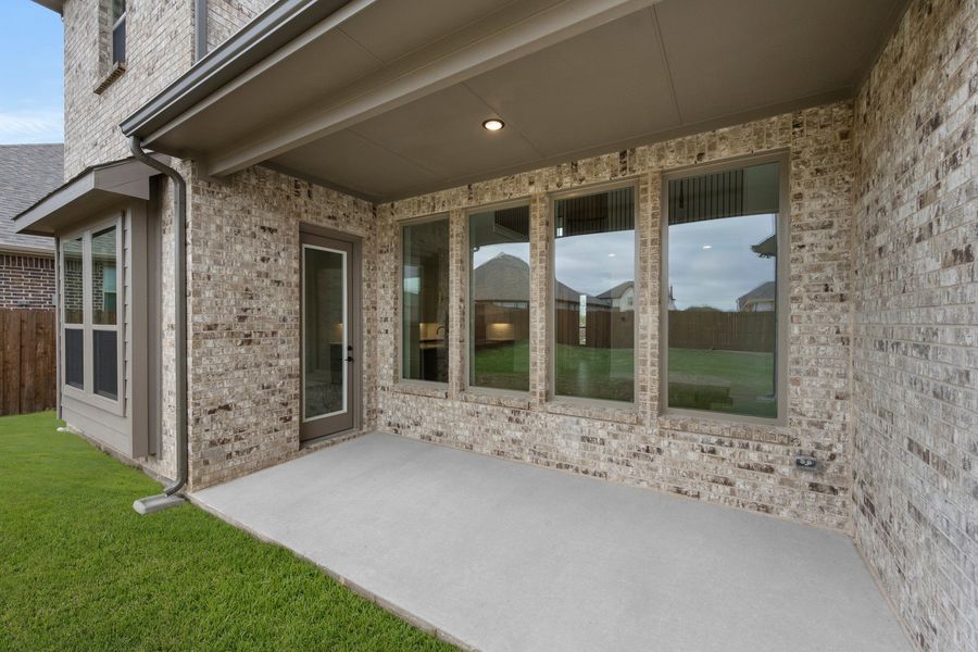 Exterior details and patio area of a home in Hayes Crossing, Midlothian (Image 19). Exterior details and patio area of a home in Hayes Crossing, Midlothian (Image 19).