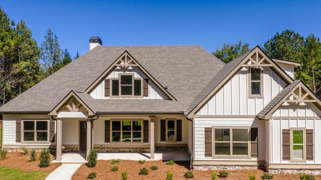 Front exterior of a new home in White Oaks, The Rock, GA, highlighting curb appeal (Image 20).