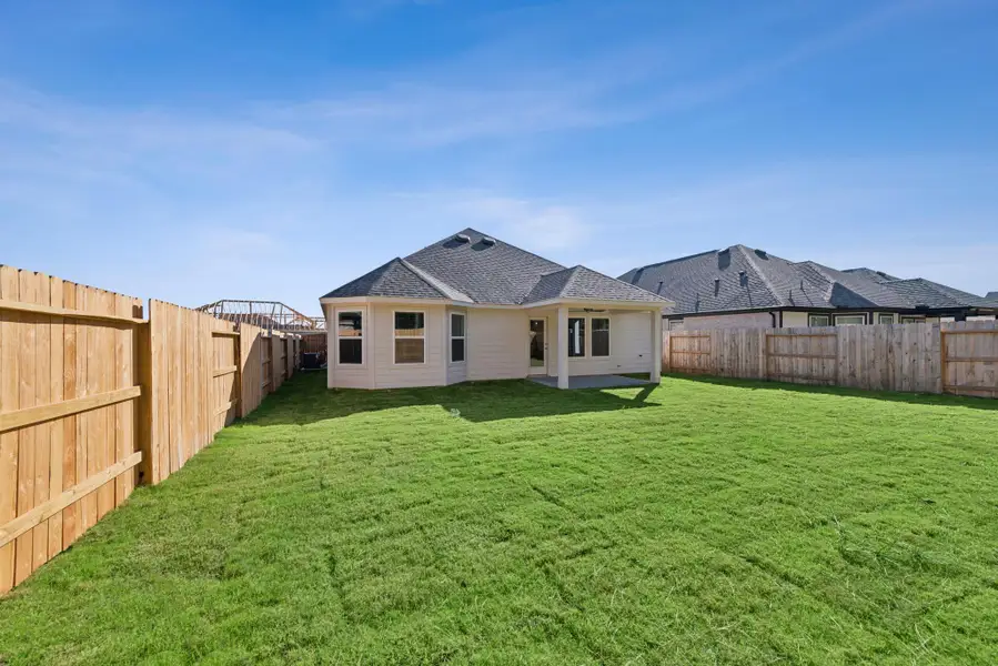 Exterior details and patio area of a home in Sorella, Tomball (Image 11).