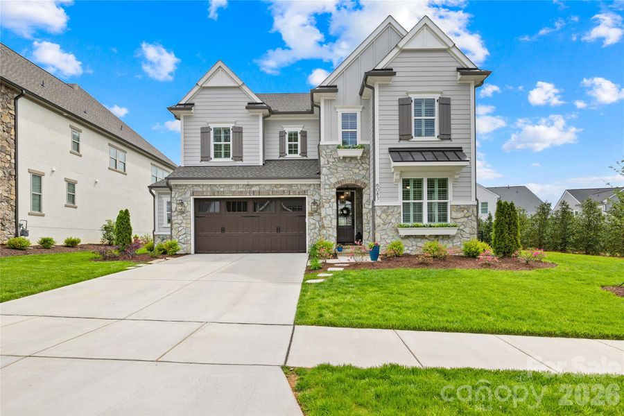 Front exterior of a new home in , Fort Mill, SC, highlighting curb appeal (Image 21).