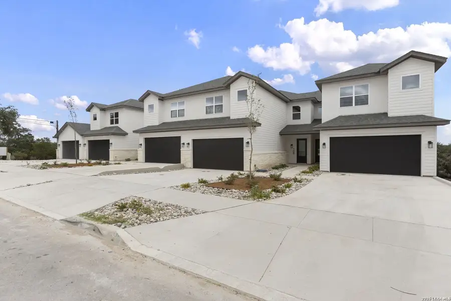 Front exterior of a new home in , Boerne, TX, highlighting curb appeal (Image 24).