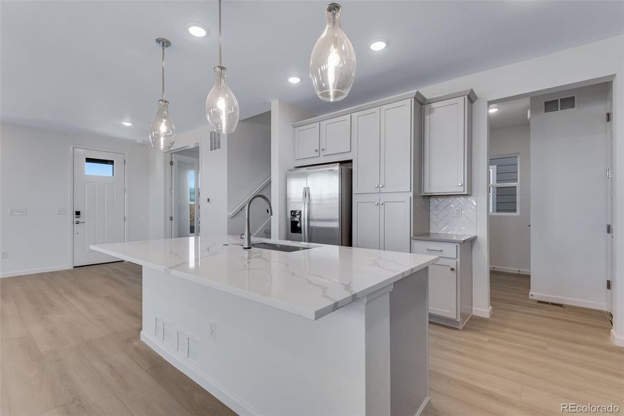 Furnished interior view inside a new home in Crescendo at The Aurora Highlands, Aurora (Image 5).