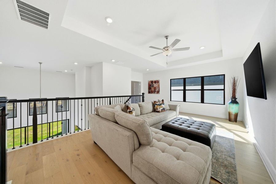 Furnished interior view inside a new home in Sienna, Missouri City (Image 27).