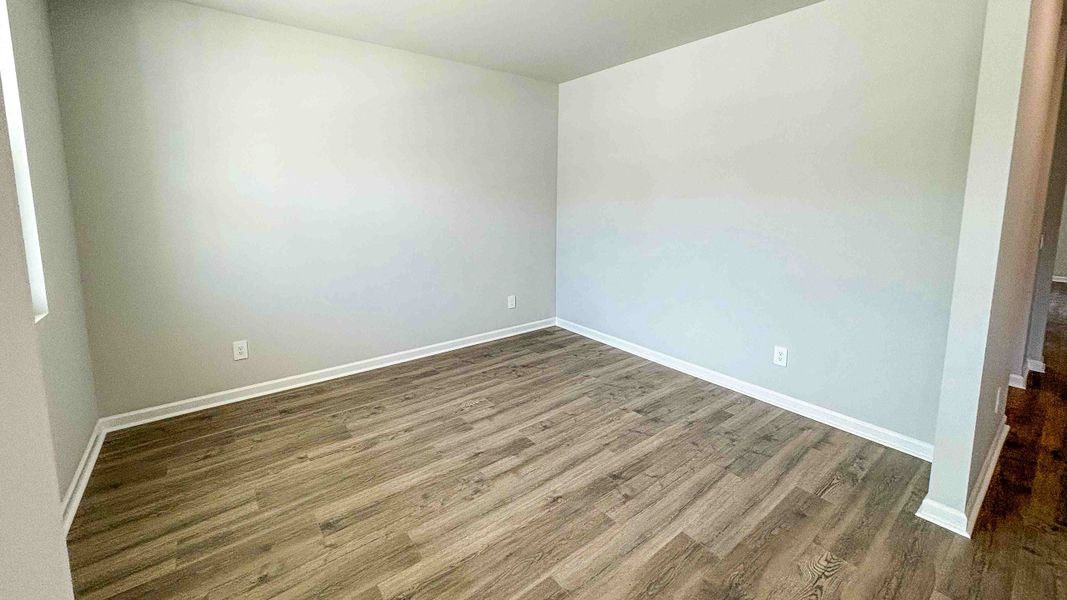 Representative unfurnished interior of a home built from the CALHOUN by D.R. Horton in Harvest Point, Spring Hill (Image 10).