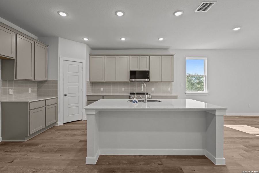 Furnished interior view inside a new home in Cinco Lakes, San Antonio (Image 6).