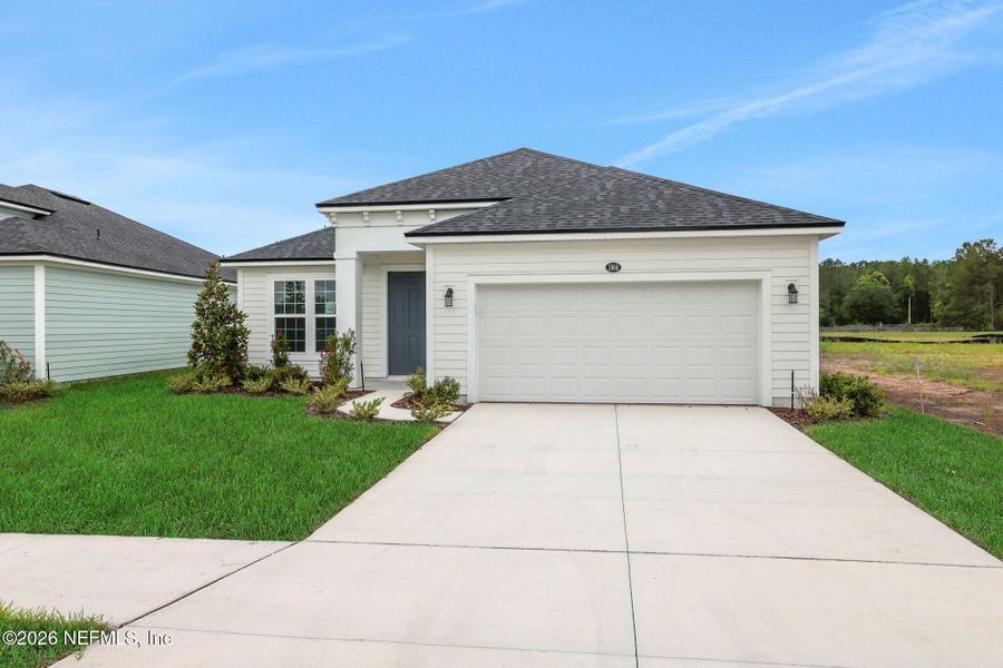 Front exterior of a new home in Amberly, Green Cove Springs, FL, highlighting curb appeal (Image 18). Front exterior of a new home in Amberly, Green Cove Springs, FL, highlighting curb appeal (Image 18).