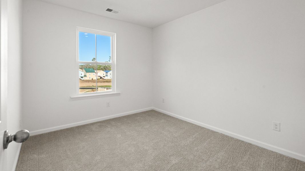 Furnished interior view inside a new home in Seabreeze Crossing, Little River (Image 14).