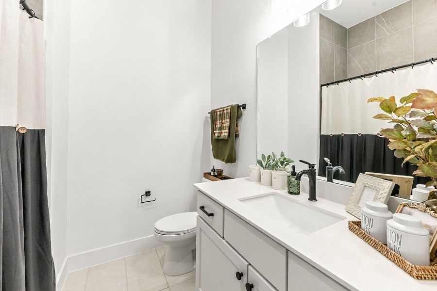 Furnished interior view inside a new home in , Conroe (Image 38).