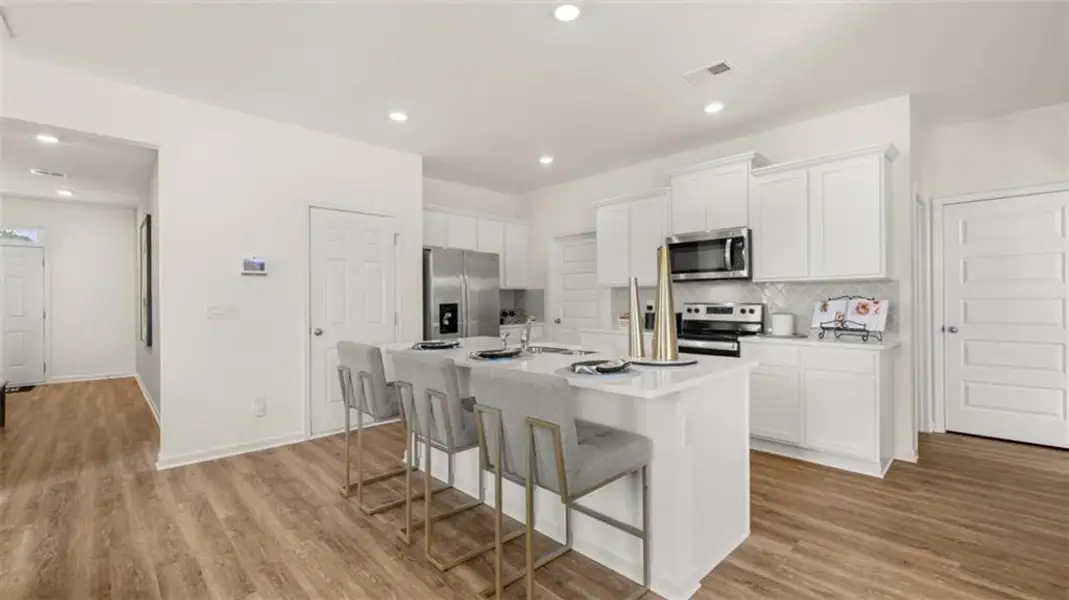 Furnished interior view inside a new home in Shoal Creek, Hampton (Image 4).