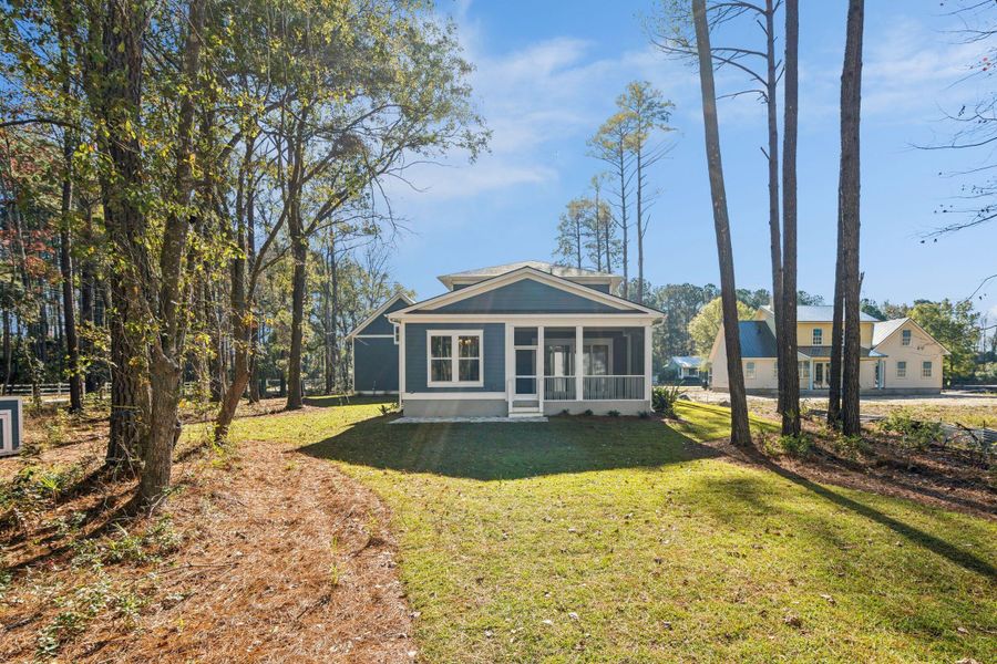 Exterior details and patio area of a home in , Awendaw (Image 36).