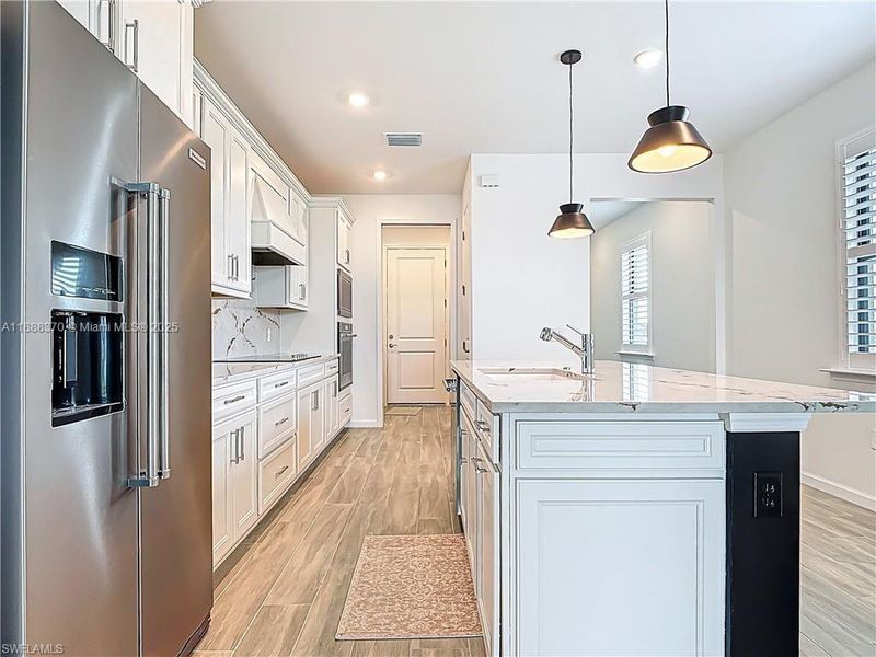 Furnished interior view inside a new home in , Ave Maria (Image 7).