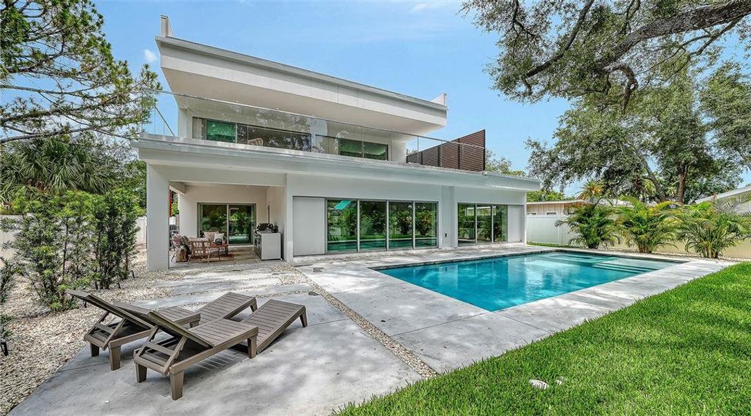 Exterior details and patio area of a home in , Sarasota (Image 37).