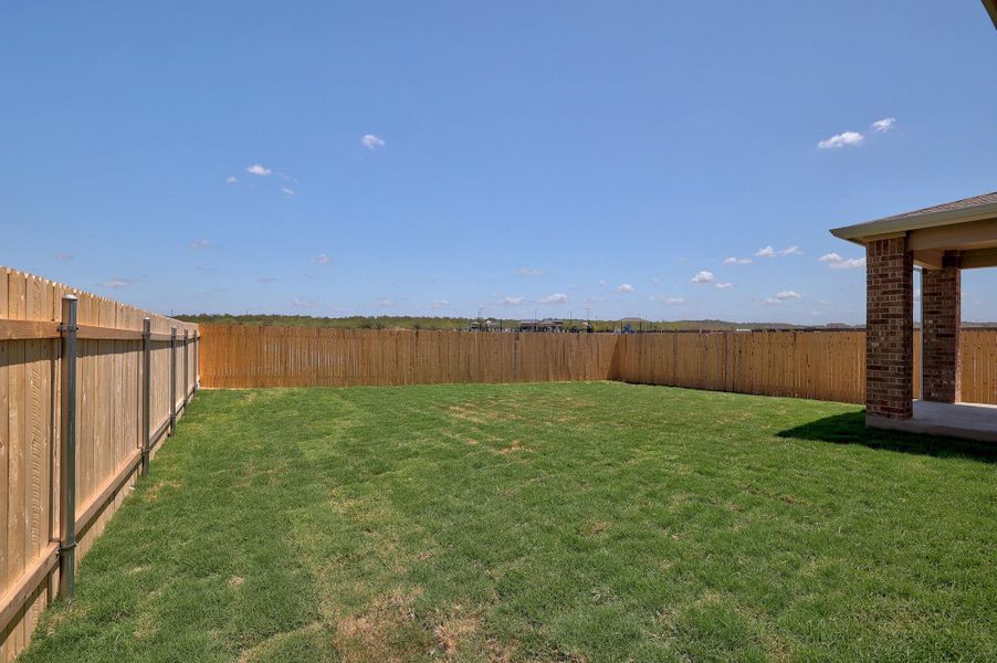 Exterior details and patio area of a home in Stoney Chase, Del Valle (Image 21).