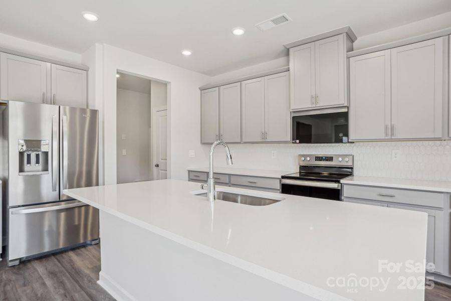 Photo is not of the actual home, but is an inspirational photo of builder’s model home and may depict options, furnishings, and/or decorator features that are not included