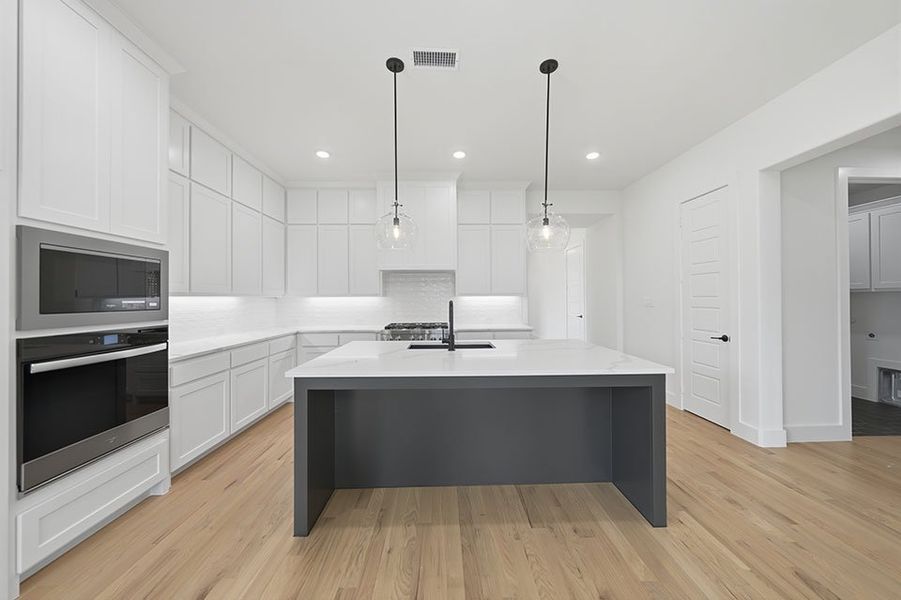 Furnished interior view inside a new home in Estates at Rockhill, Frisco (Image 7).