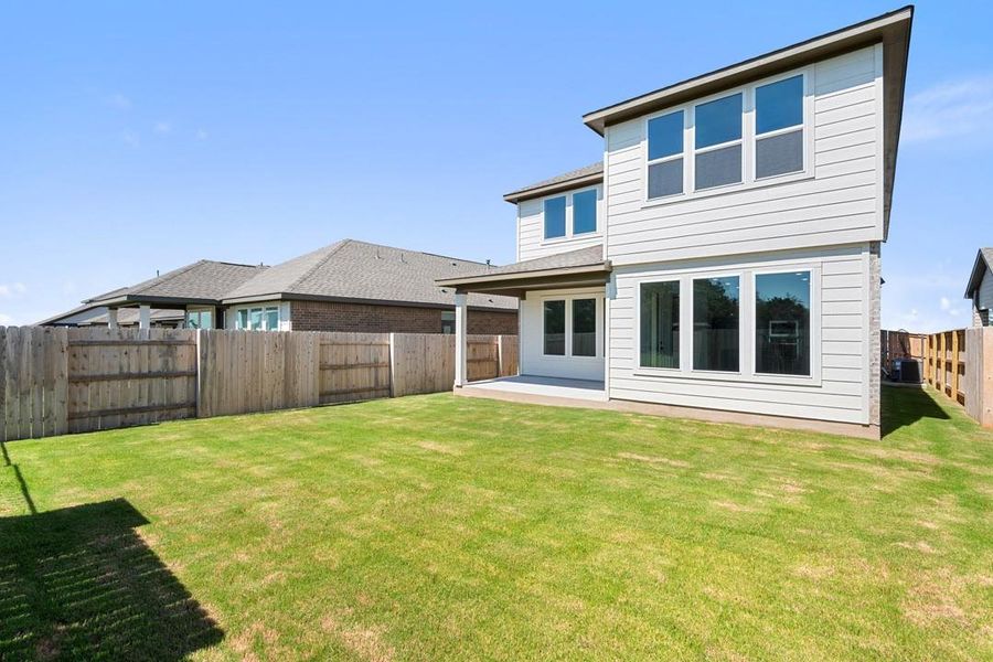 Exterior details and patio area of a home in Terrace Collection at Lariat, Liberty Hill (Image 23). Exterior details and patio area of a home in Terrace Collection at Lariat, Liberty Hill (Image 23).