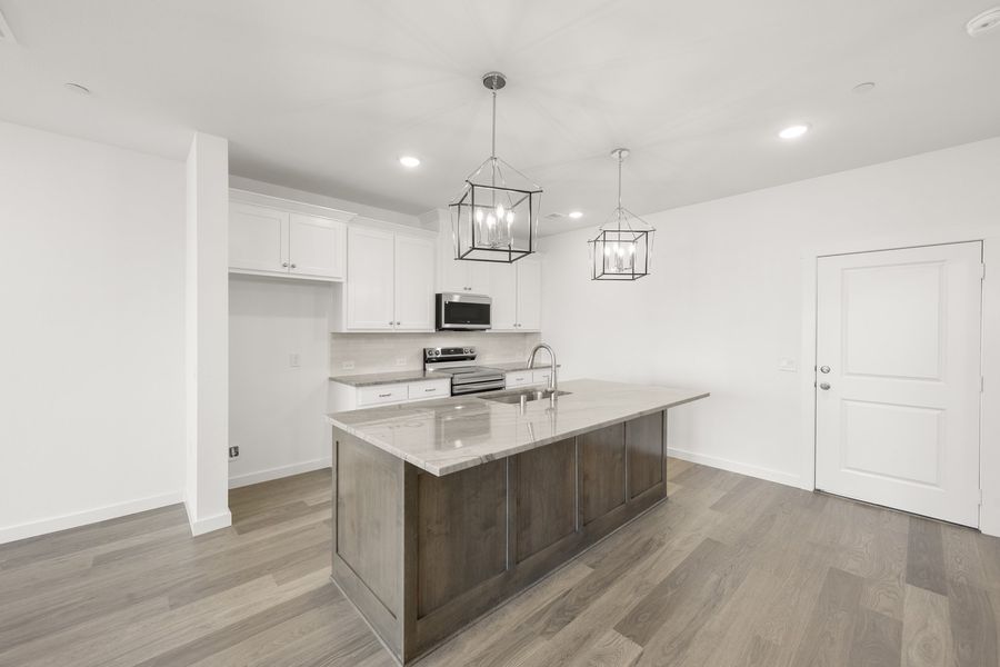 Furnished interior view inside a new home in Wildridge, Oak Point (Image 5).