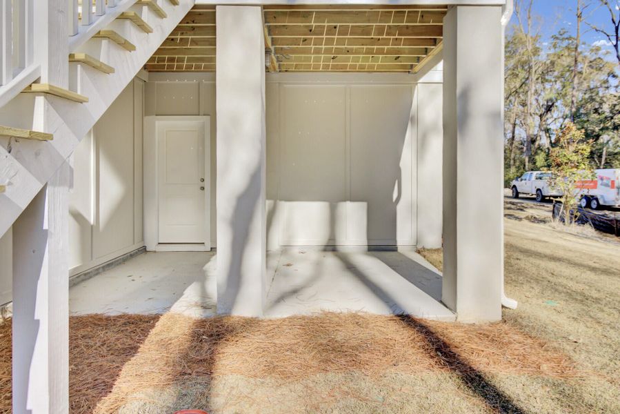 Exterior details and patio area of a home in , Johns Island (Image 26).