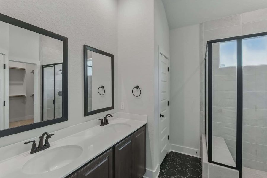 Representative furnished interior of a home built from the Charleston by Chesmar Homes in Stillwater Ranch, Buda (Image 8).