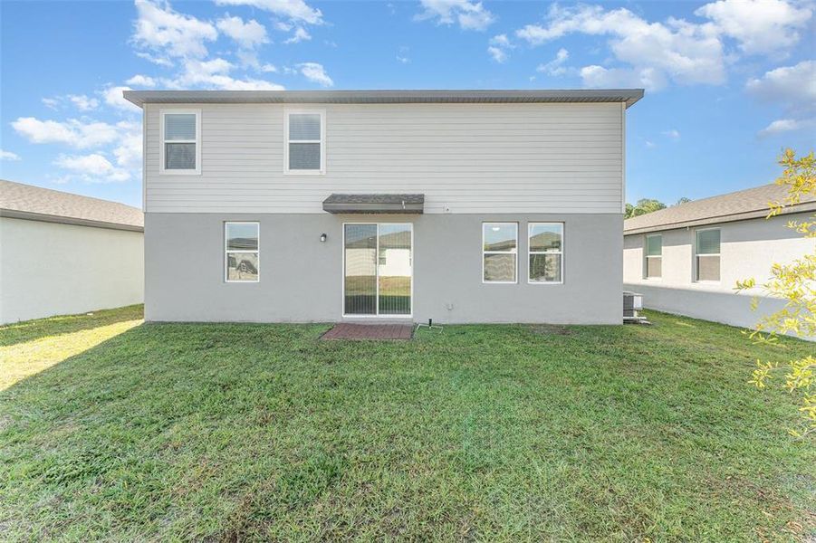 Exterior details and patio area of a home in Villamar - Signature Series, Winter Haven (Image 21).