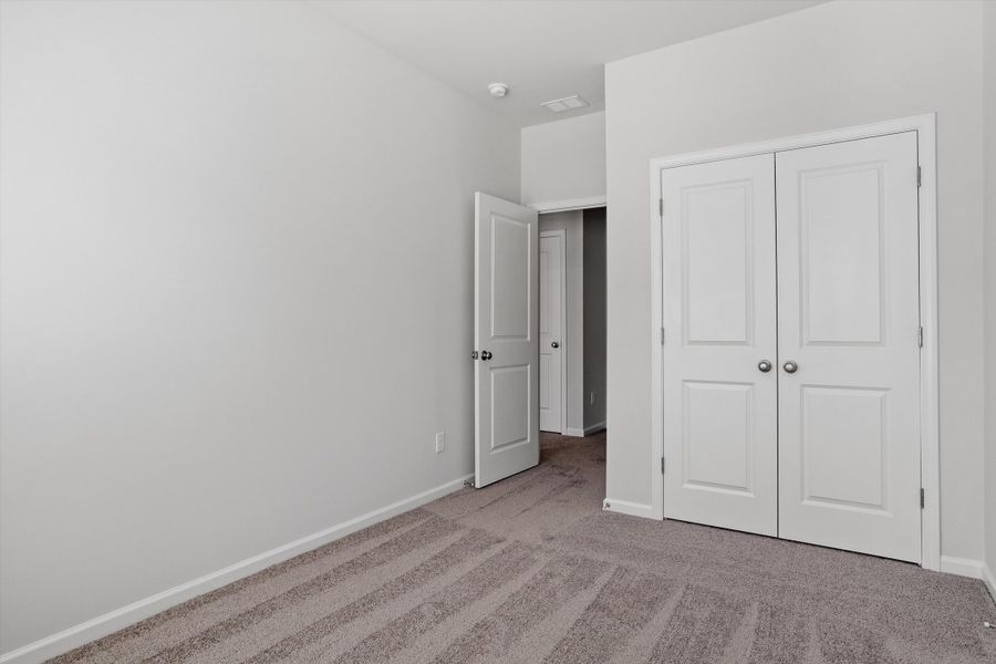 Spacious, unfurnished interior of a new home in West Main Townhomes, Sanford (Image 28).