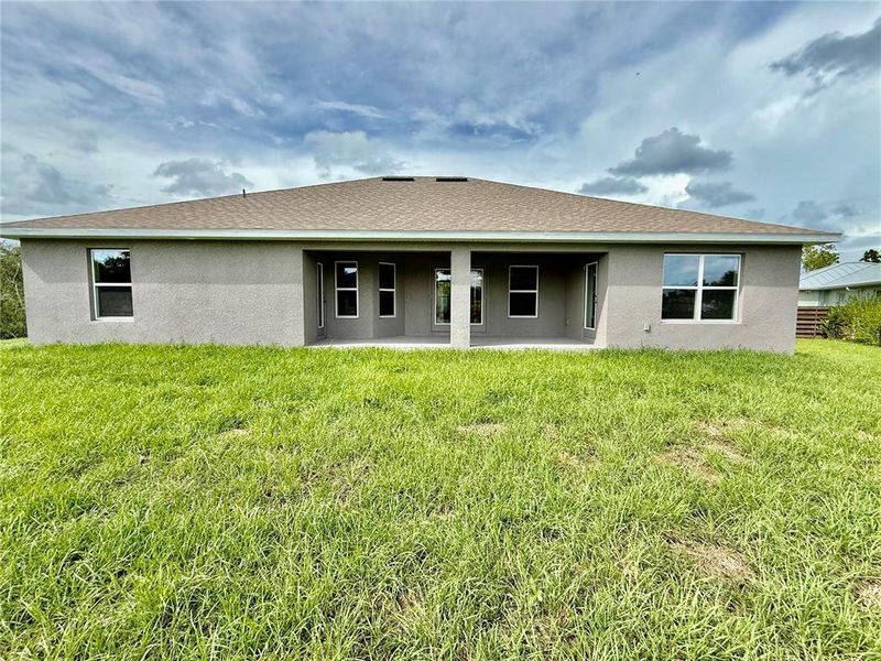 Front exterior of a new home in South Gulf Cove, Port Charlotte, FL, highlighting curb appeal (Image 19).