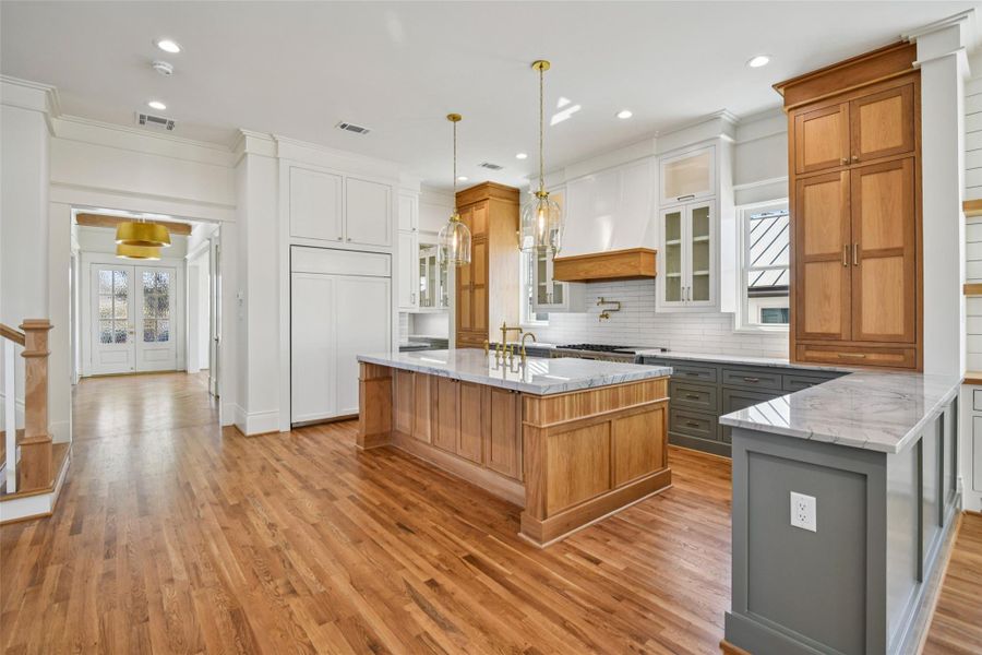 The entire kitchen perspective. The kitchen is amazing for hosting guests and holidays as it has bumper seating on the peninsula. The entire kitchen perspective. The kitchen is amazing for hosting guests and holidays as it has bumper seating on the peninsula.