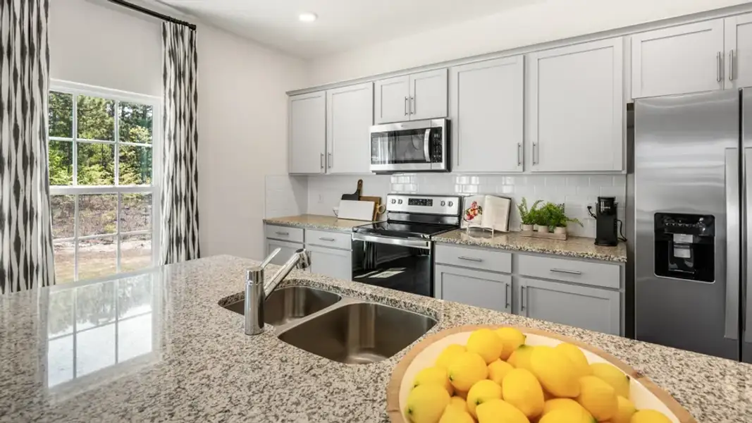 Furnished interior view inside a new home in Olive Branch, Wilson's Mills (Image 9).