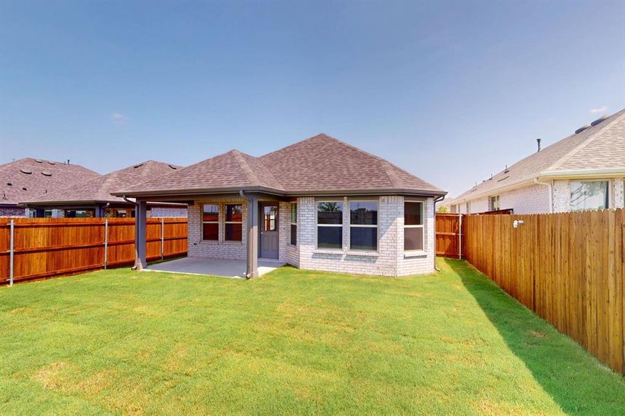 Front exterior of a new home in Elevon, Lavon, TX, highlighting curb appeal (Image 16). Front exterior of a new home in Elevon, Lavon, TX, highlighting curb appeal (Image 16).